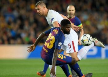 Dzeko_Umtiti_Barcellona_Roma_lapresse_2018