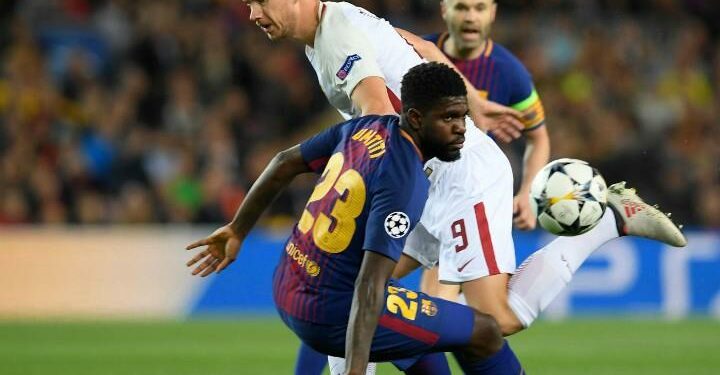 Dzeko_Umtiti_Barcellona_Roma_lapresse_2018