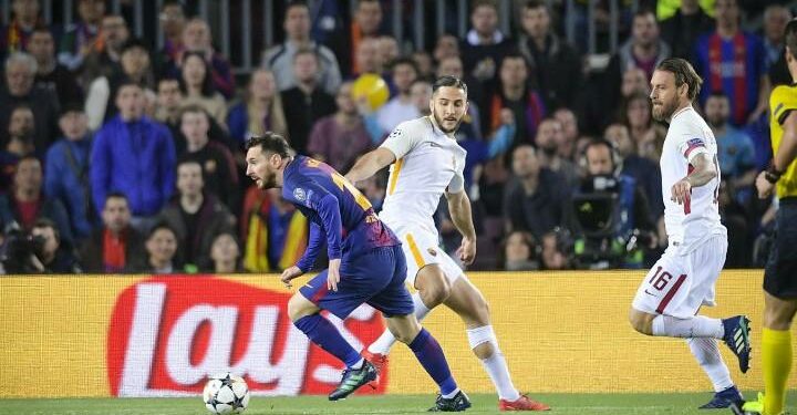 Messi_Manolas_Barcellona_Roma_lapresse_2018