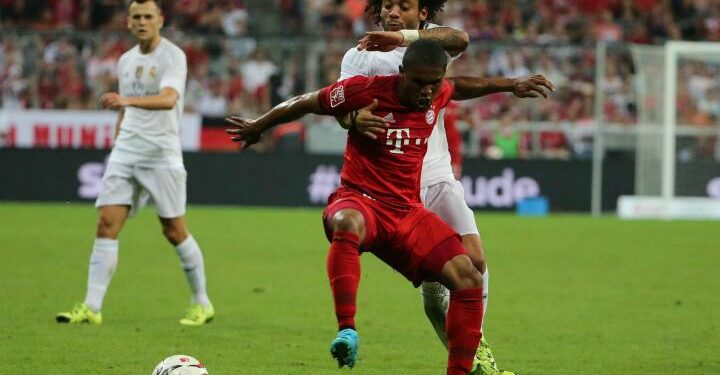 DouglasCosta_Marcelo_Bayern_Real_lapresse_2017