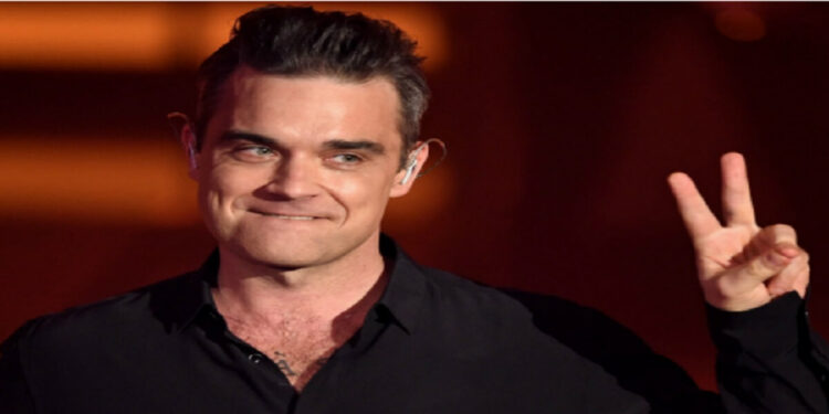 Robbie Williams, "Non riuscivo a stare in piedi"