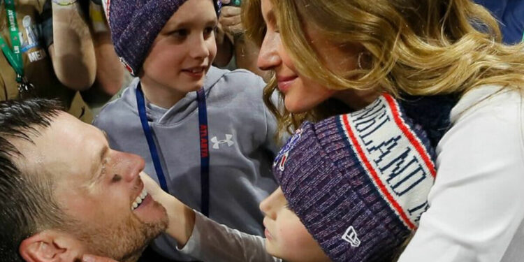 Gisele Bundchen bacia il marito Tom Brady