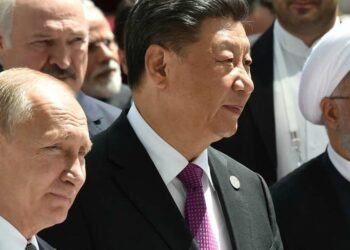 Vladimir Putin, Xi Jinping e Hassan Rouani (LaPresse)