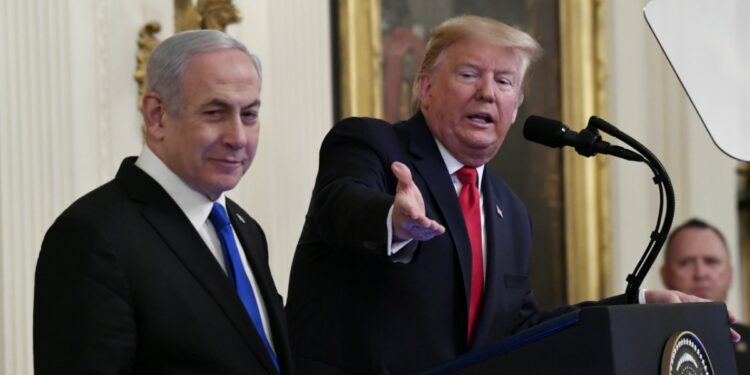 President Donald Trump speaks during an event with Israeli Prime Minister Benjamin Netanyahu in the East Room of the White House in Washington, Tuesday, Jan. 28, 2020. (AP Photo/Susan Walsh)