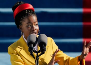 American poet Amanda Gorman reads a poem during the 59th Presidential Inauguration at the U.S. Capitol in Washington, Wednesday, Jan. 20, 2021. (AP Photo/Patrick Semansky, Pool)